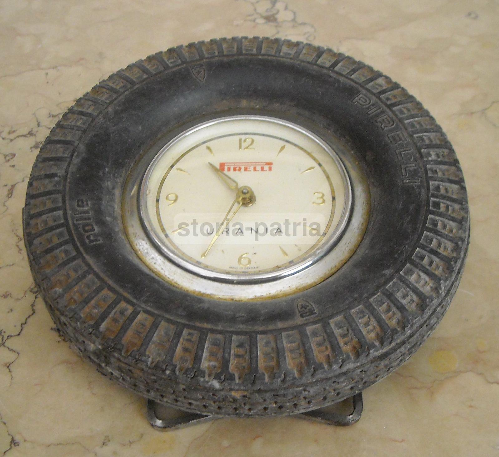 Automobilismo, Pneumatici Pirelli, Urania, Rolle, Grazioso Orologio Pubblicitario immagine 1